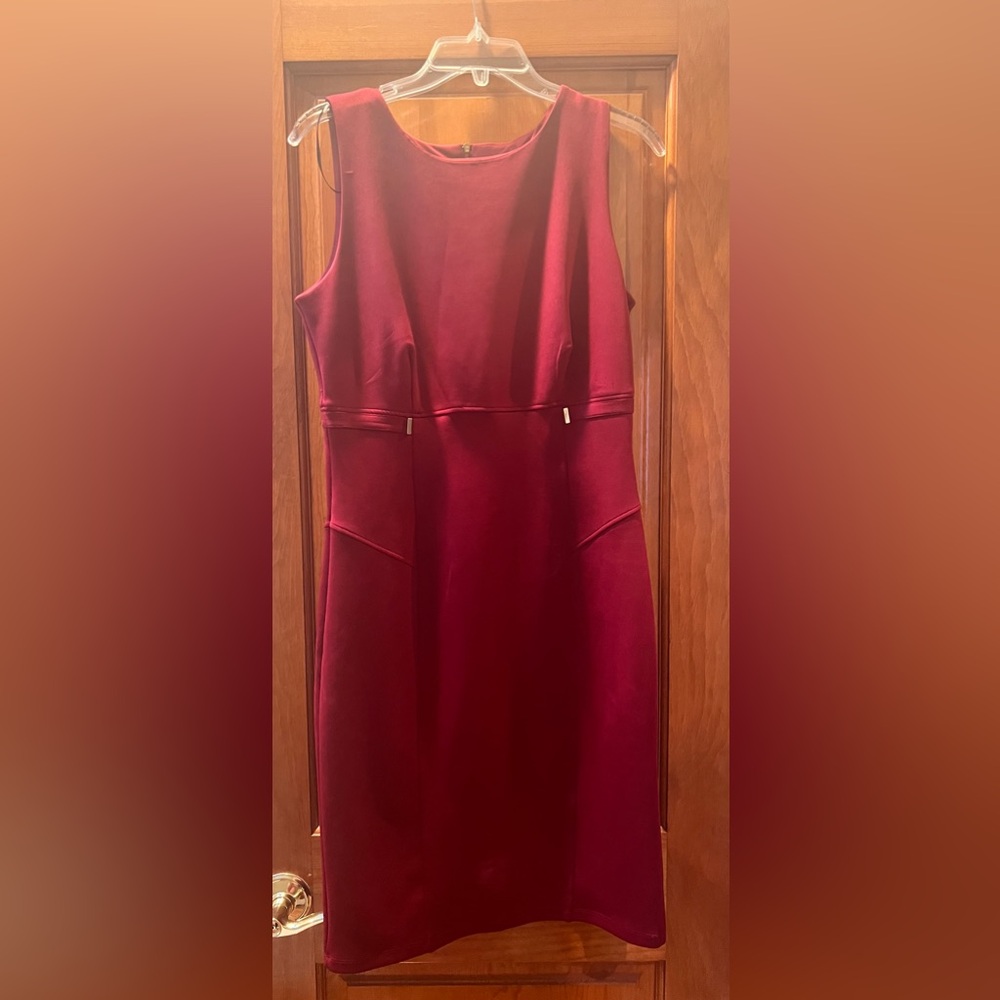 Red sleeveless dress.